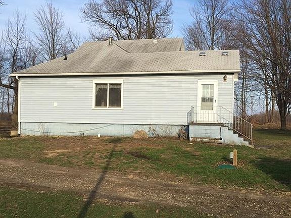 Back side of house. Circle driveway