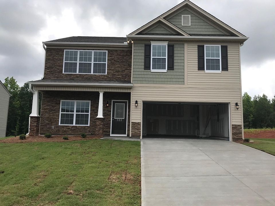 Two story house with large back yard
