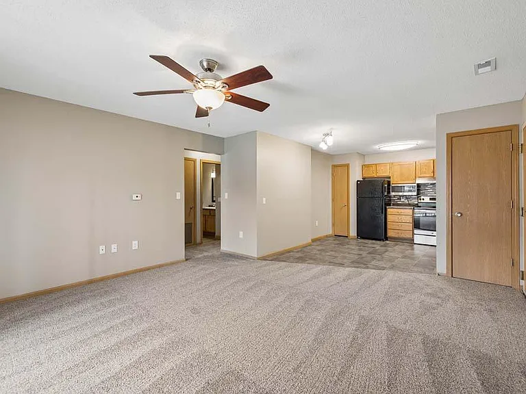 An open living area creates a comfortable setting with plenty of room to relax, gather, and feel at home.