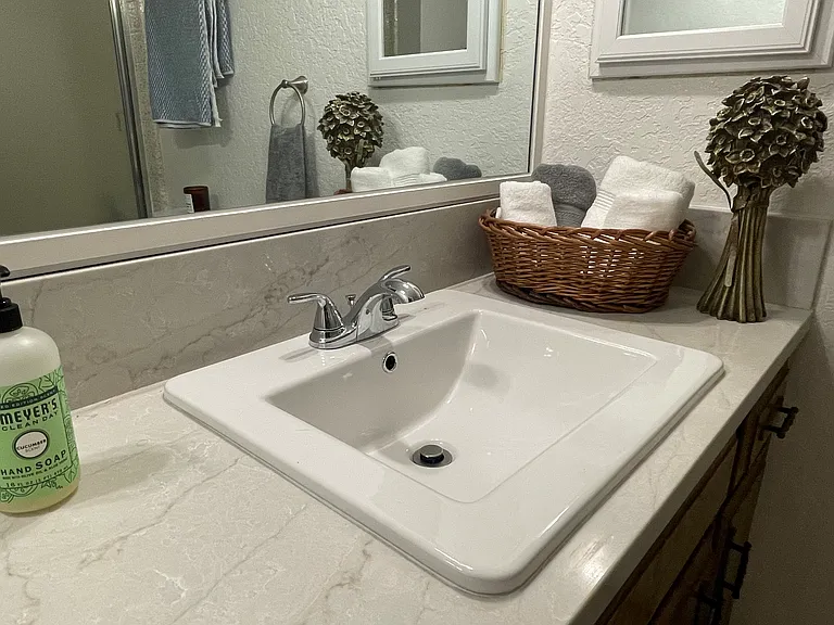 Both bathrooms have been updated, with new marble countertops, faucets, sinks, mirrors and new tile floors (during a September 2024 through April 2025 renovation).