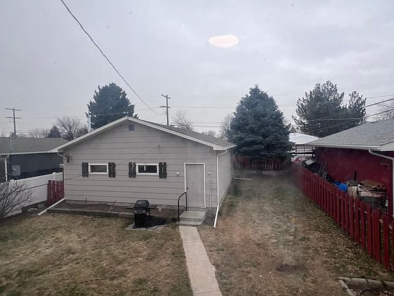 Fenced in backyard and garage