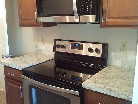 new wood cabinets, stainless appliance