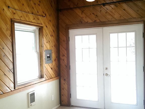 Bedroom with shared patio