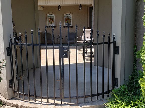 Gated front courtyard.