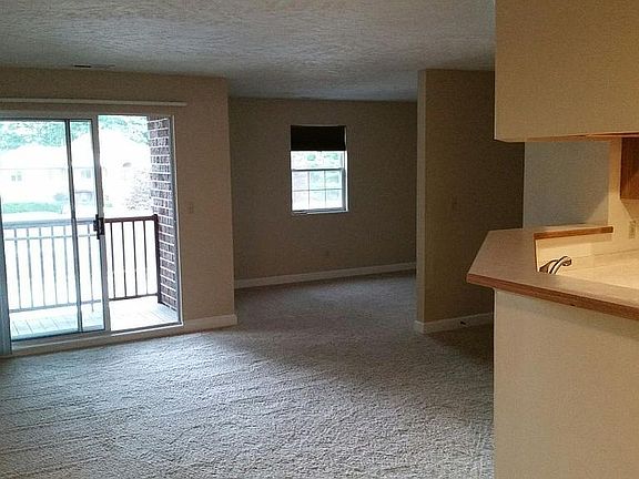 Good sized living room with access to the private balconey
