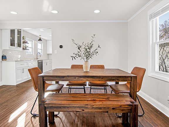 Dining room table, with view into the kitchen