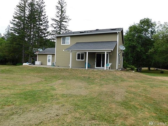 Back View of Home with Patio that runs full width of House 