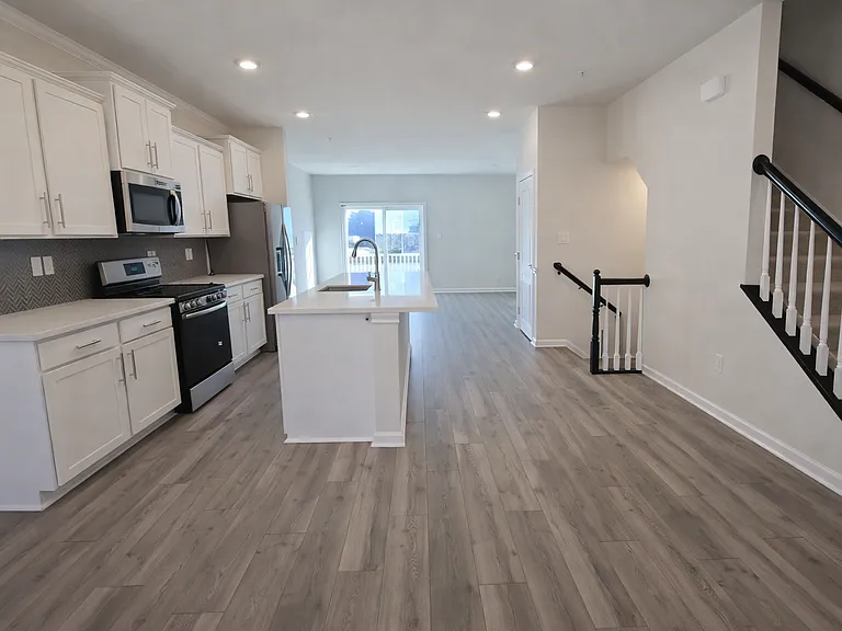 8 - Second floor kitchen and living room view 2_12242025