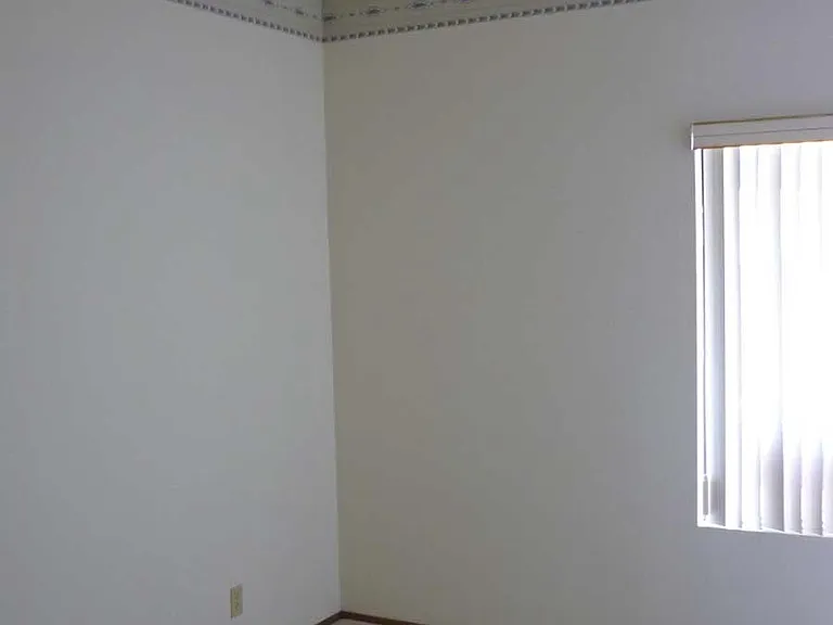 Master bedroom, looking northwest. This bedroom also has built-in overhead dimmable lighting.