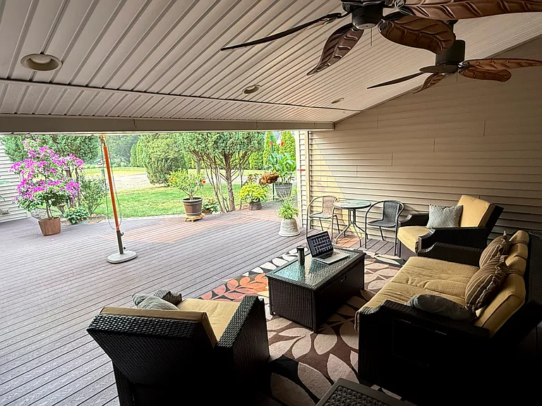 Covered deck seating area for relaxing, reading, or studying outside
