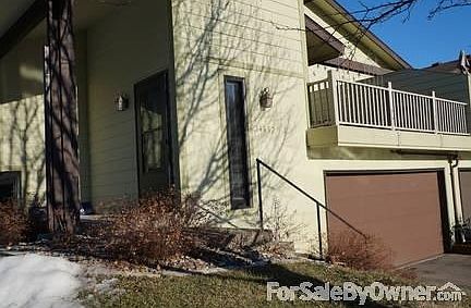 Outside view of Townhome
						:
						Split level with 2 car garage and deck
