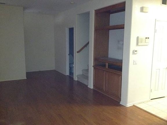 Living room with built in TV console.
