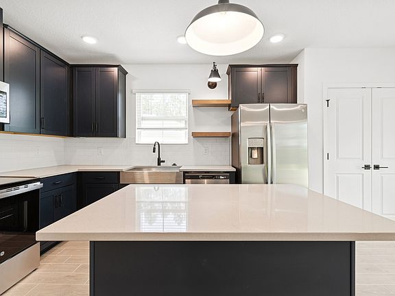 Kitchen with floating shelves
