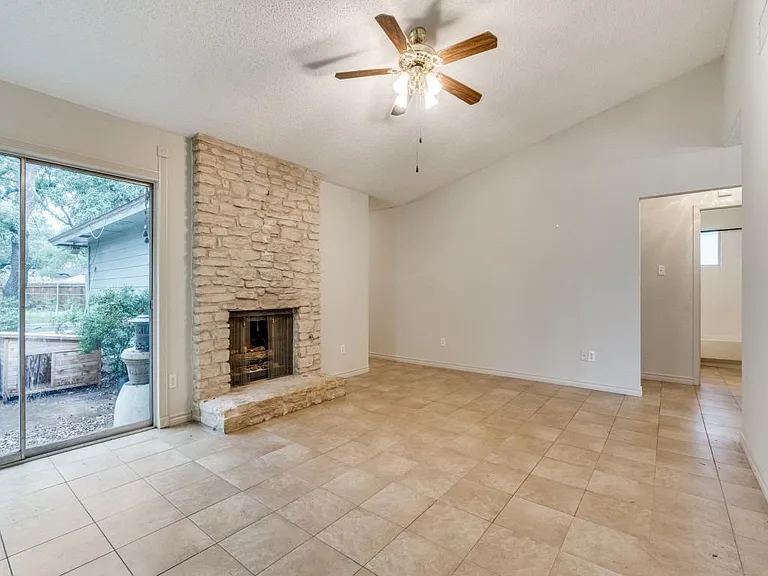 STONE FIREPLACE for the cold nights
TILE NO CARPET