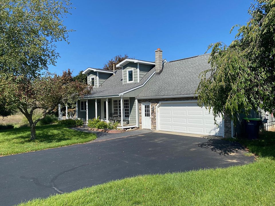 Cape Cod home at end of small subdivision with beautiful sunrises and sunsets.