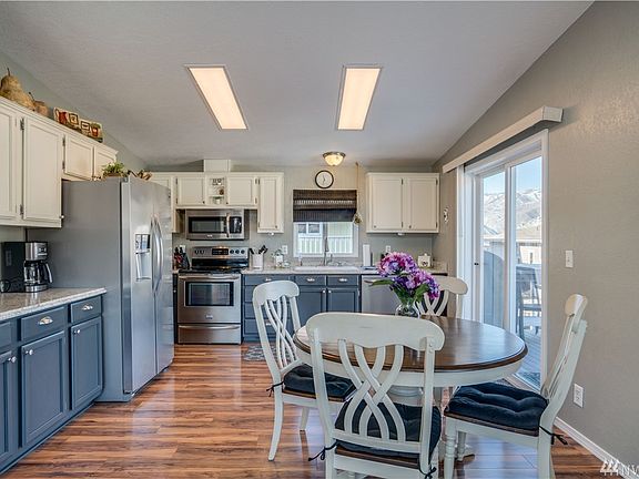 The slider off of the kitchen make this home ideal for entertaining and enjoying the deck for meals. 