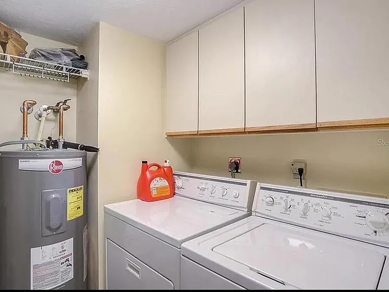 Laundry room in condo