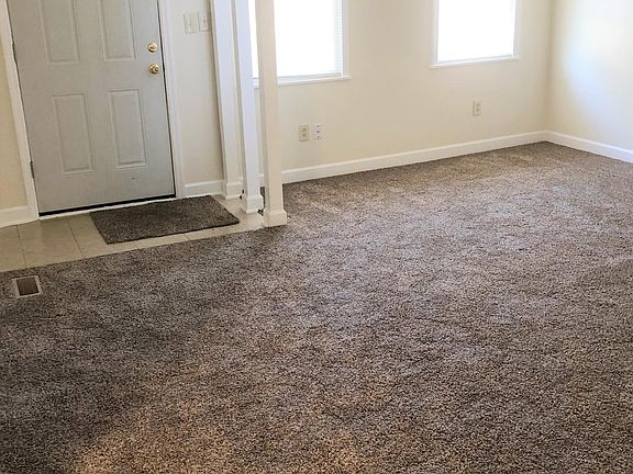 Living Room, entryway, large windows