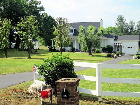 Road View of Fenced Property