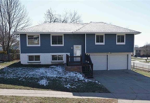New Roof, Luxury Siding, Windows, Front Patio in Desirable Neighborhood with Millard Schools!