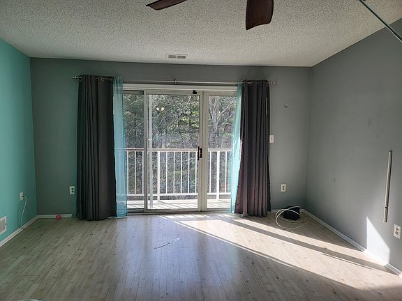 "Enjoy ample natural light and a beautiful view of the woods."