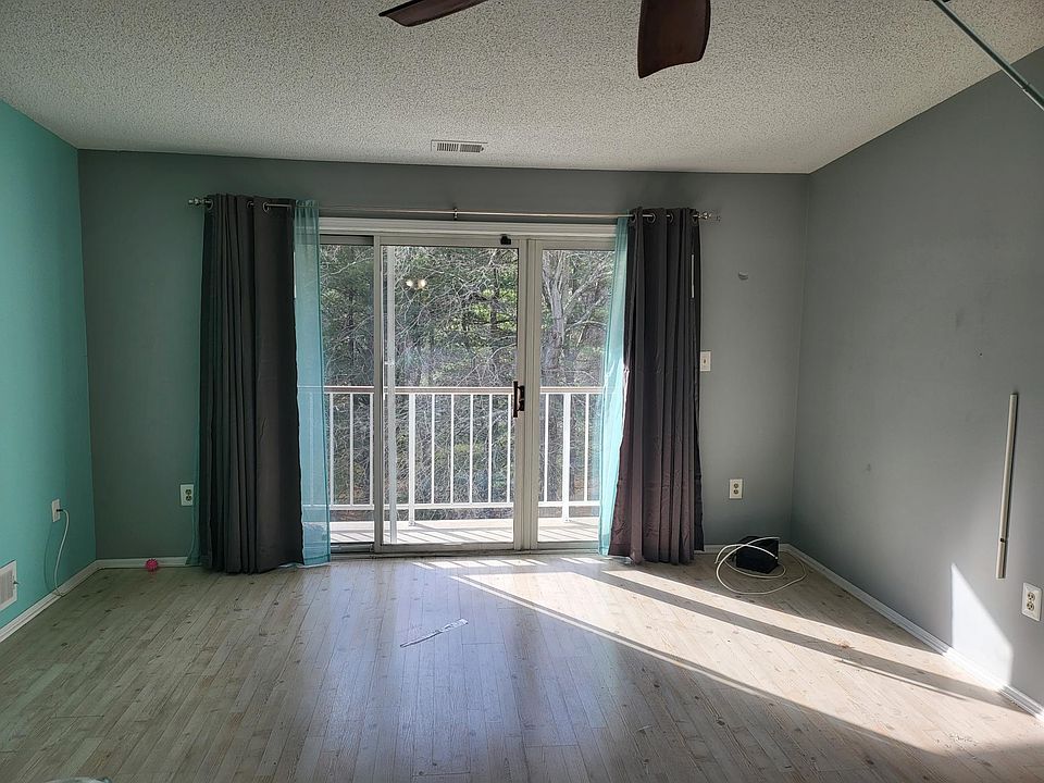 "Enjoy ample natural light and a beautiful view of the woods."