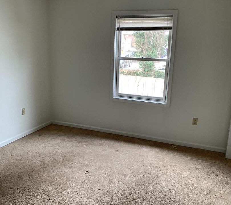 Bedroom with two reach-in closets.