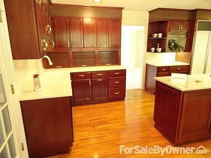 Granite island and Corian countertops