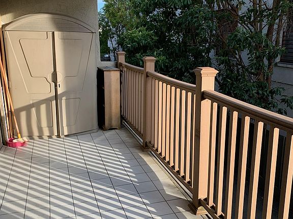 Patio with storage cabinet
