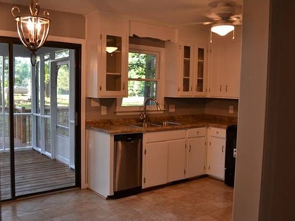 screened porch off of kitche