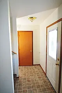 front entry way with coat/storage closet