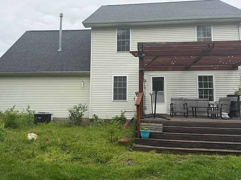 Deck off of the kitchen. It will be restained prior to move in