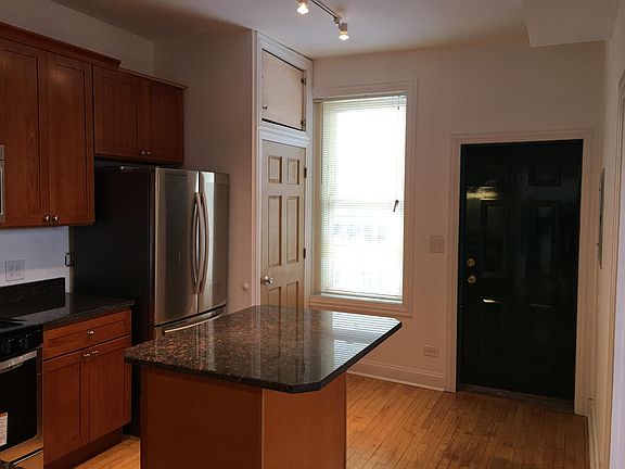 New rehabbed kitchen with outdoor deck off the back door