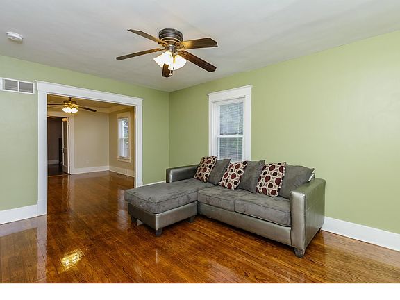 Gorgeous wood floors in living room and dining room
