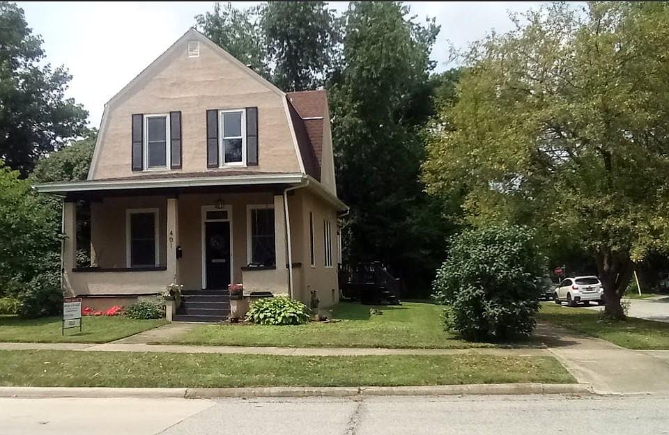 Exterior - corner lot with mature trees