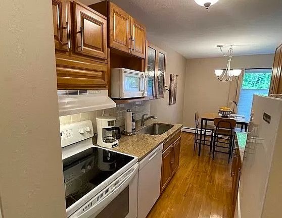 Kitchen/ dining room area. The pictures are representative of the property but the rental does not include furnishings or decorations.