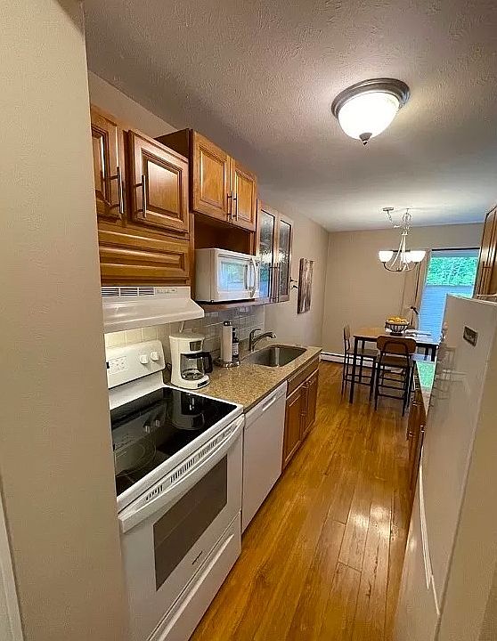 Kitchen/ dining room area. The pictures are representative of the property but the rental does not include furnishings or decorations.