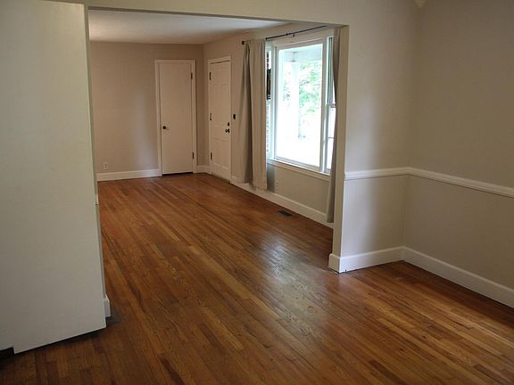 view into front living room with large window