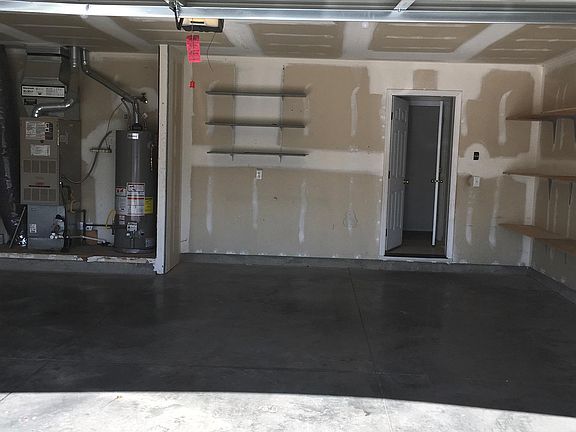 Double garage with storage shelves