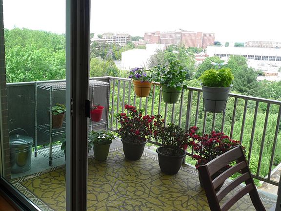 The balcony measures 13' x 6', with enough room for a four person table.