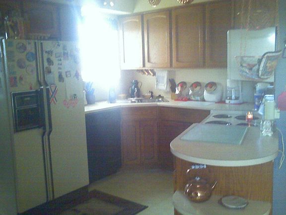 Kitchen area  Lots of cuppord space!!
