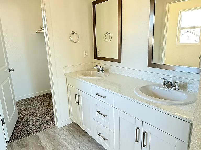 Spacious master bathroom with his and hers areas