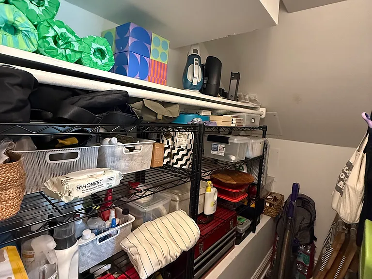 Looking in the large closet off living room