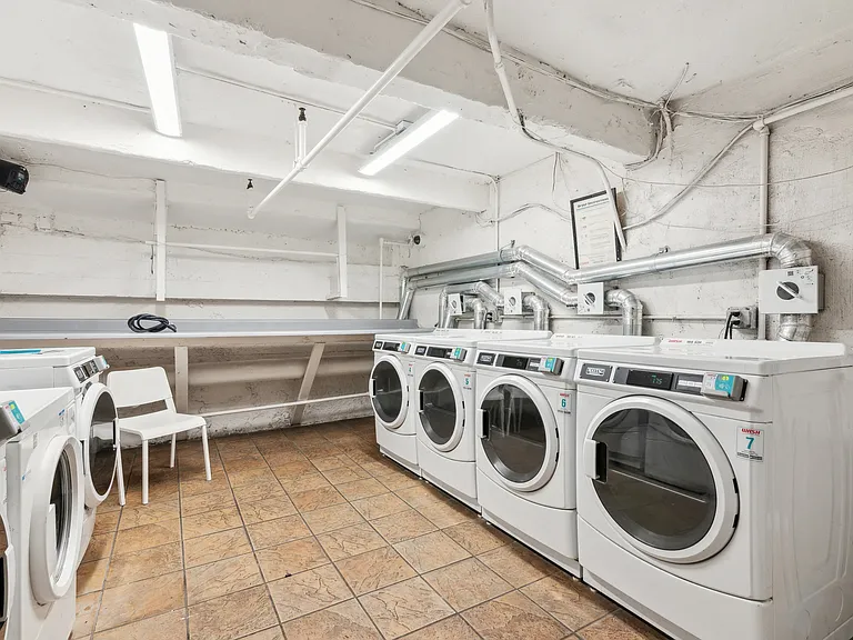 Laundry room with washing machines