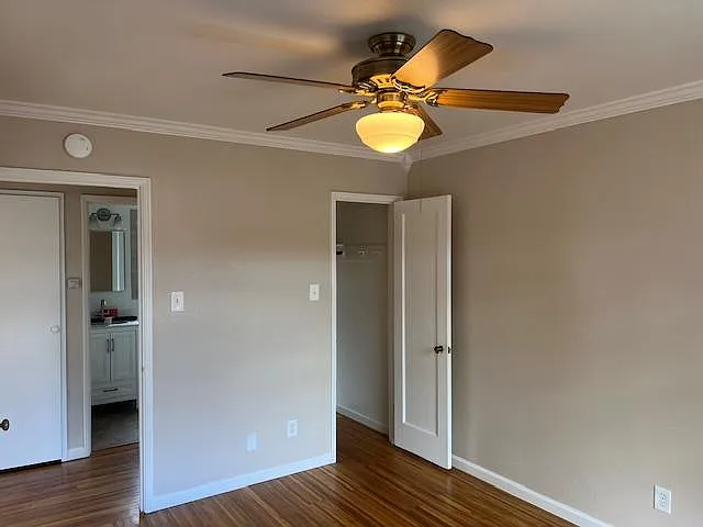 Bedroom view w/ walk-in closet