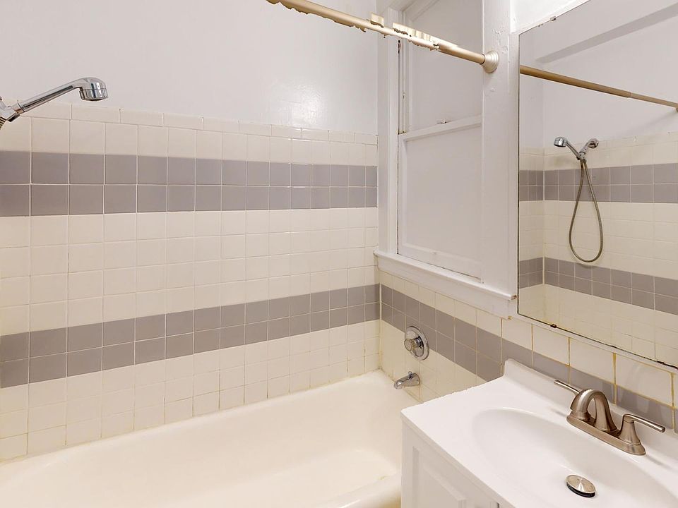Bathroom with a sink and bathtub