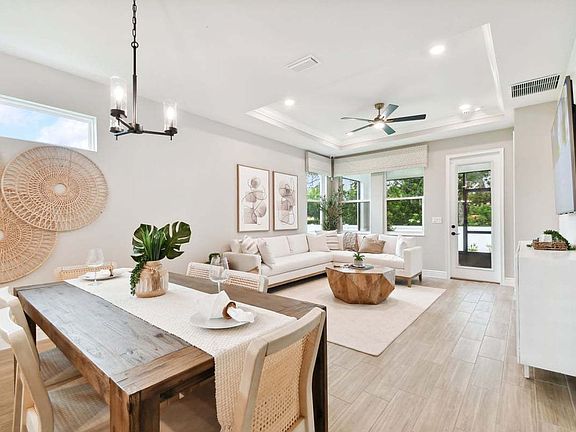 Sandpiper new construction luxury paired villa home plan open concept plan cafe and family room in 5