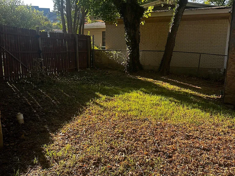 View of fenced in side yard.
