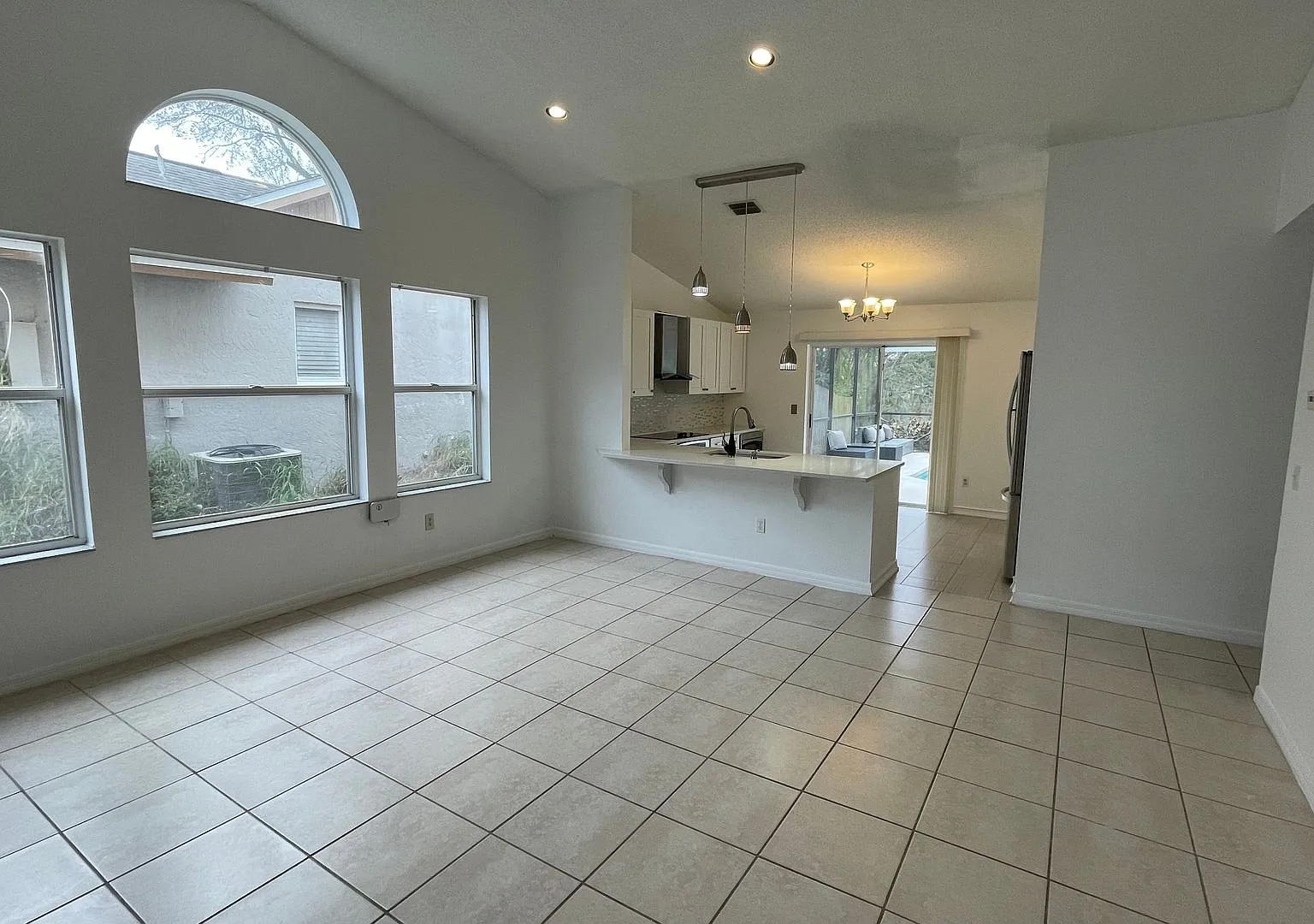 Beautiful 3-bedroom, 2-bath pool home available for rent in Kissimmee for $2,490/month. — Photo 4