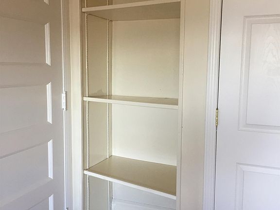 Built-in storage unit located in the bedroom/living area spa